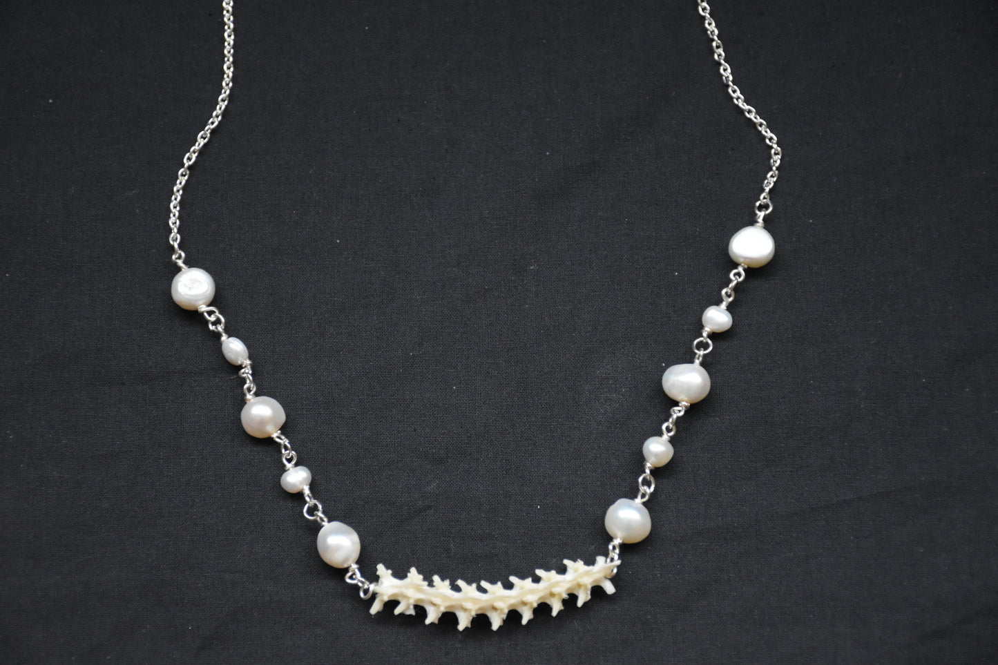 Snake pearl necklaces