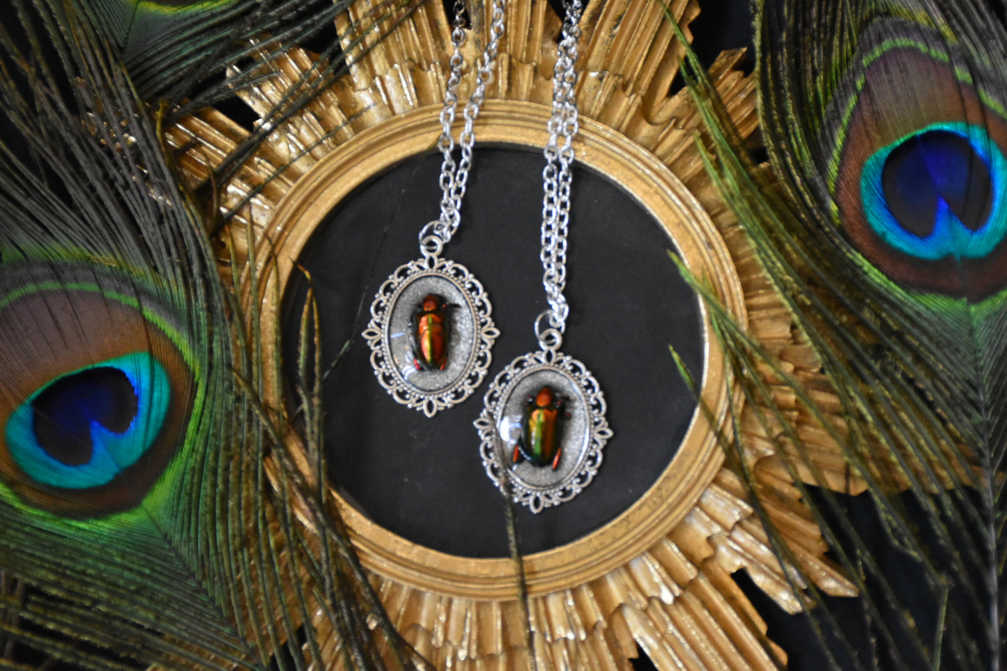 Red/green beetle necklaces
