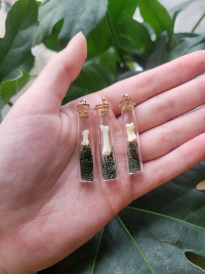 Mossy badger bone bottle necklace