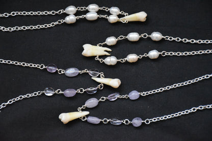 Human teeth necklace