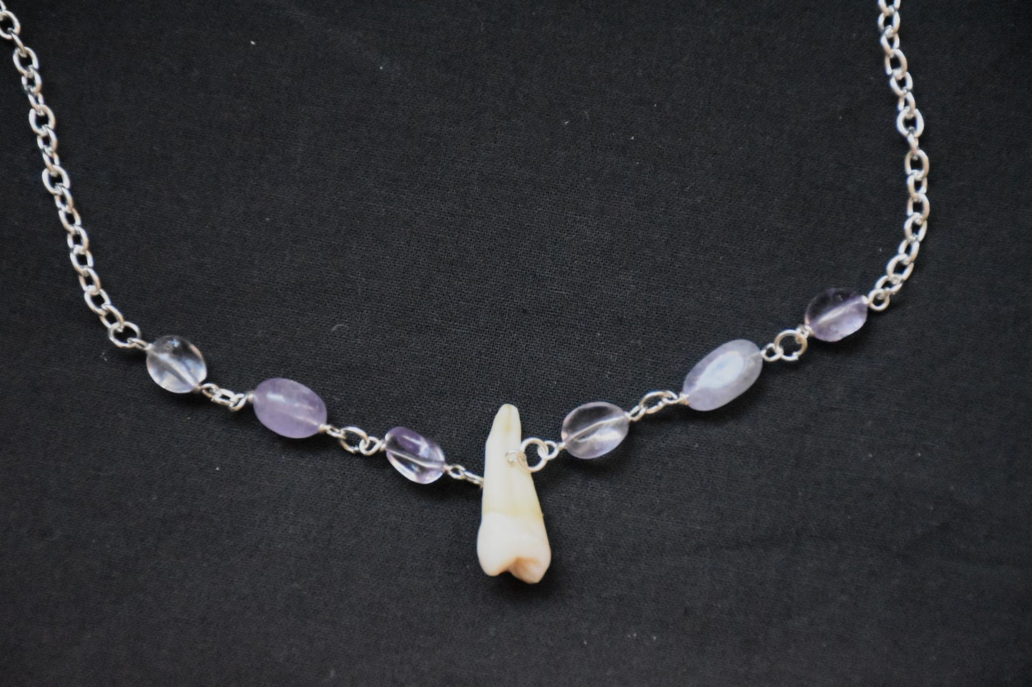 Human teeth necklace
