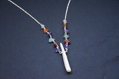 Crystal boar tusk necklaces
