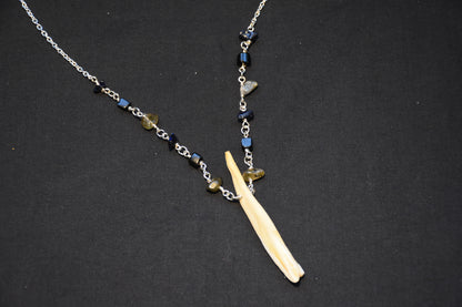 Crystal boar tusk necklaces