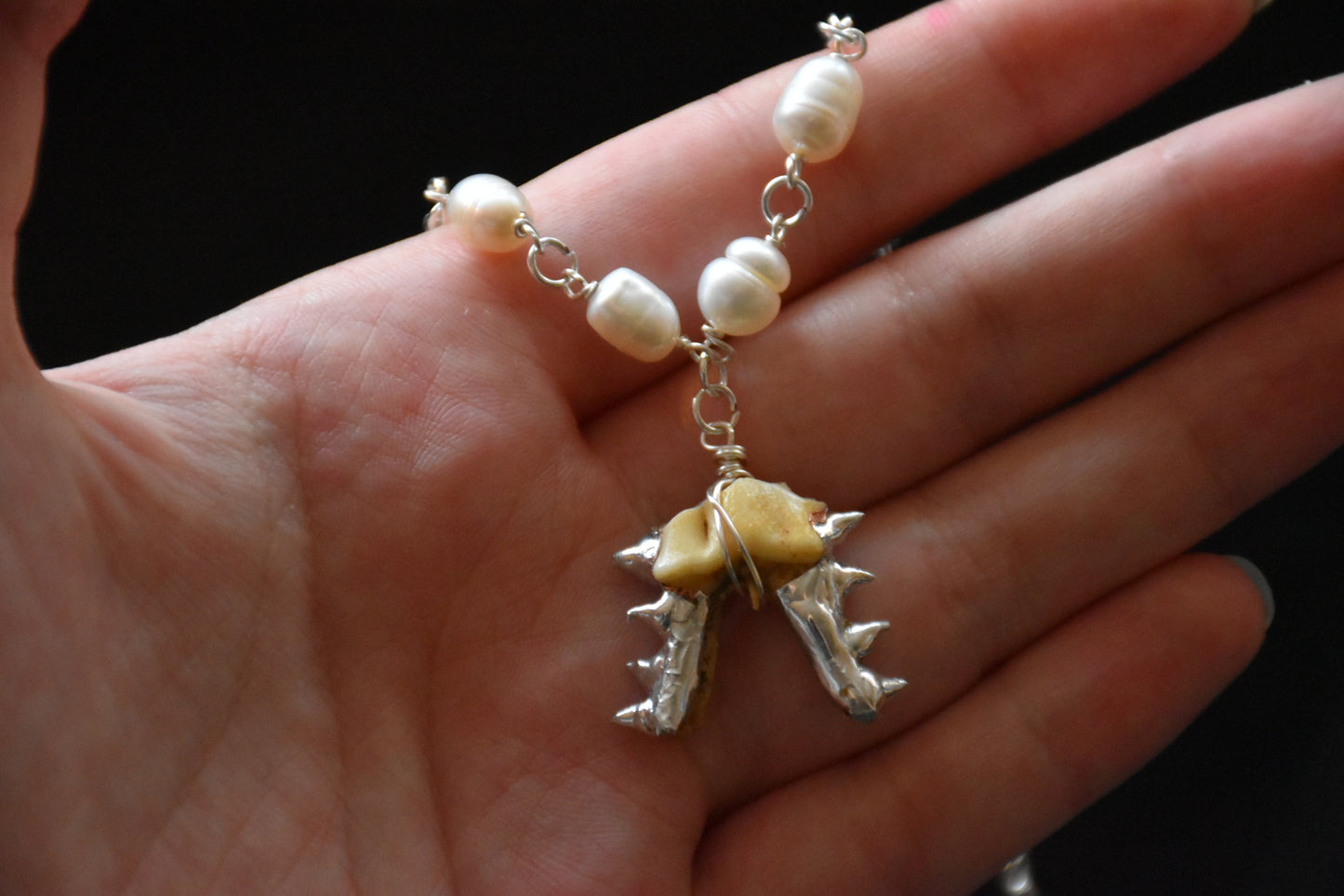 Armoured teeth necklaces
