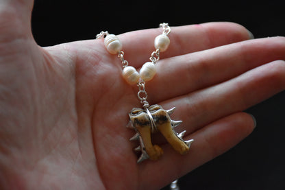 Armoured teeth necklaces