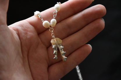 Armoured teeth necklaces