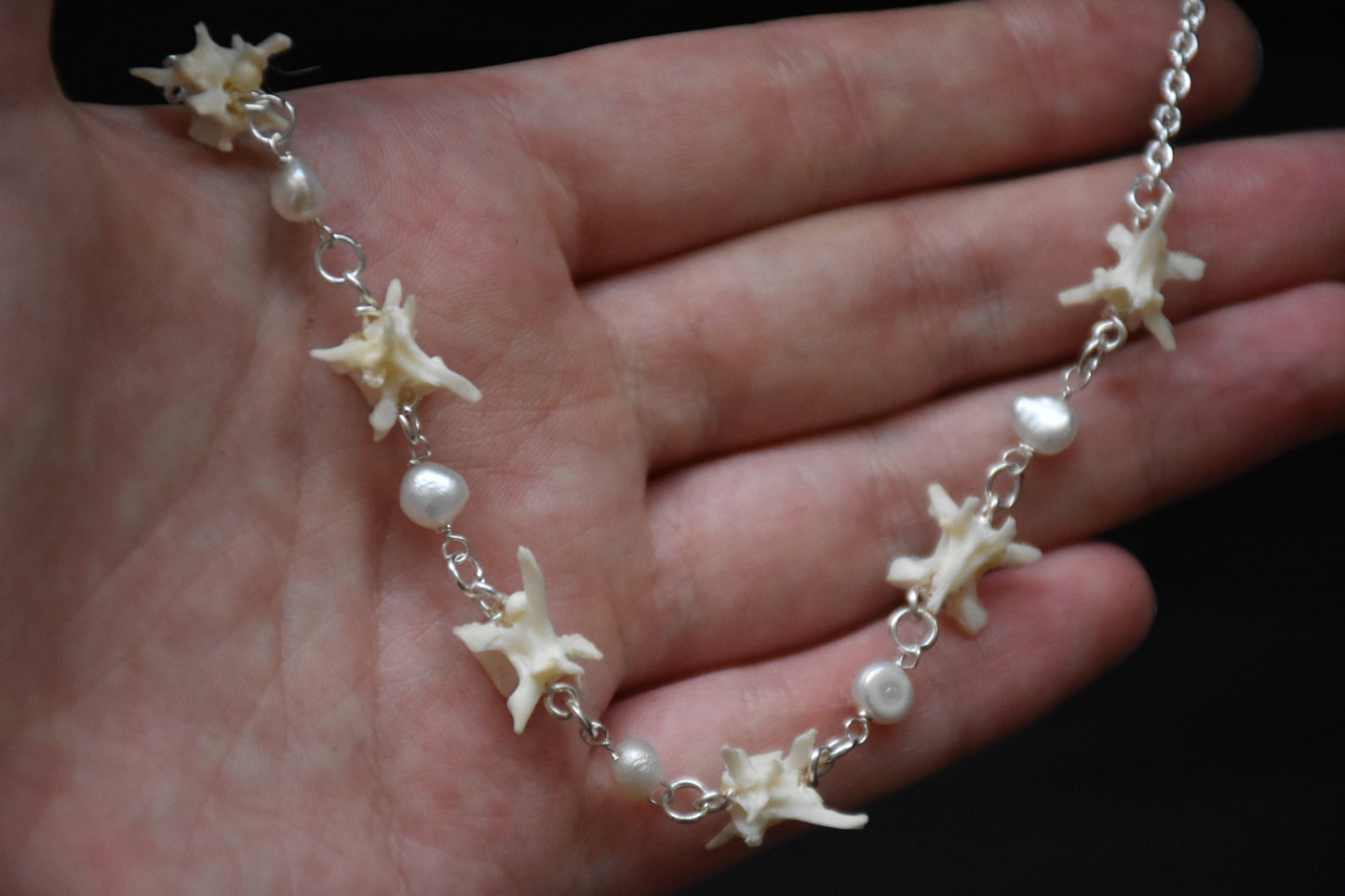 Snake pearl necklaces