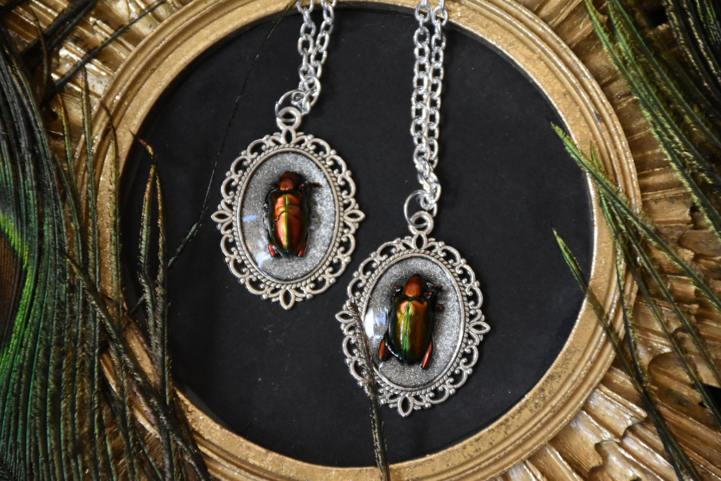 Red/green beetle necklaces