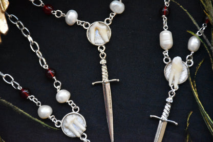 Sword tooth necklaces