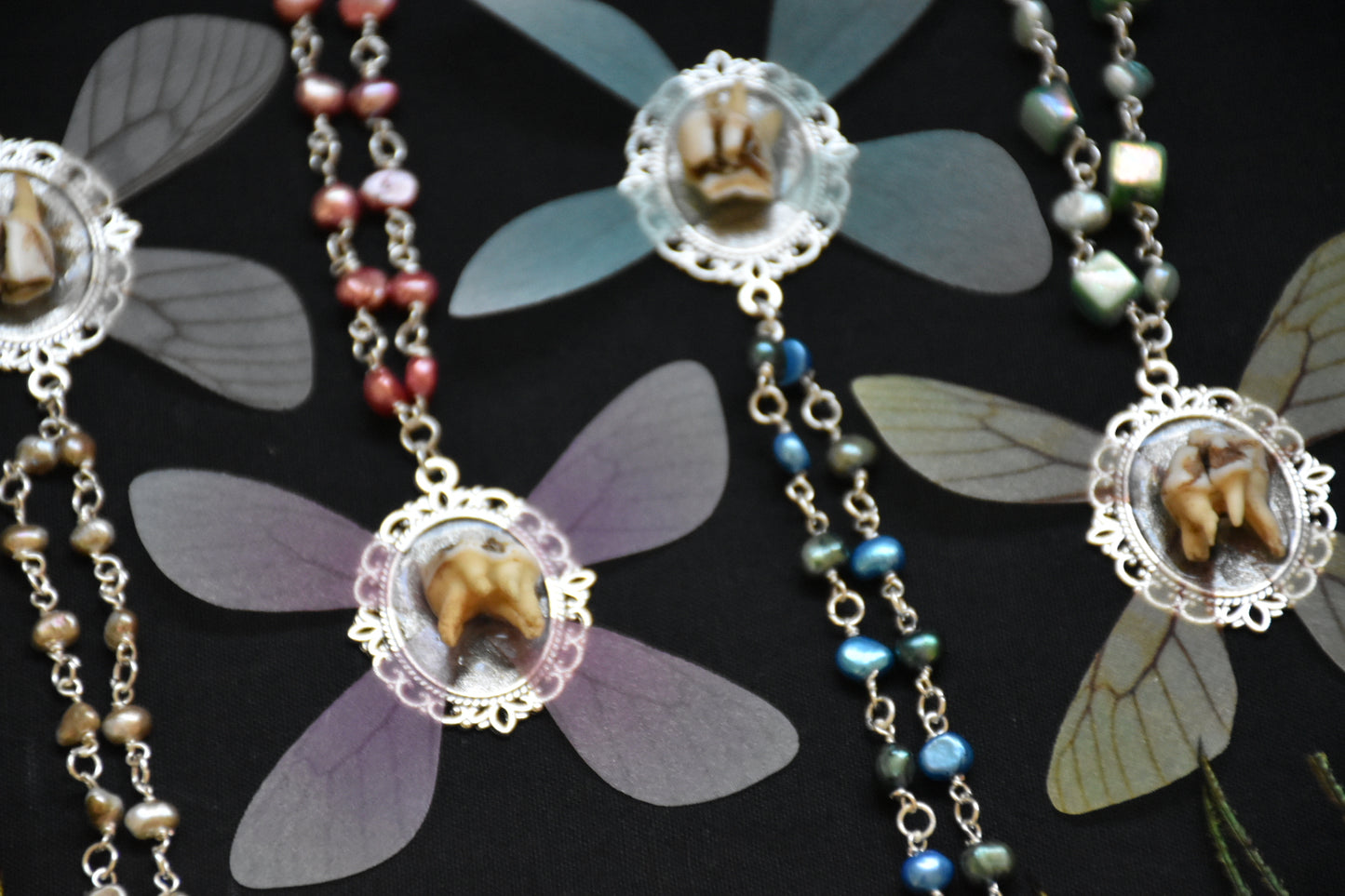 Framed tooth fairy necklace