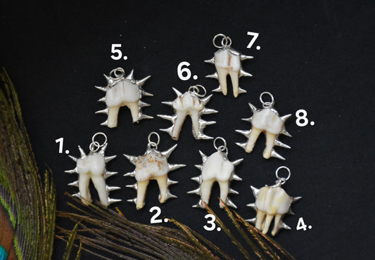 little spiky tooth pendant