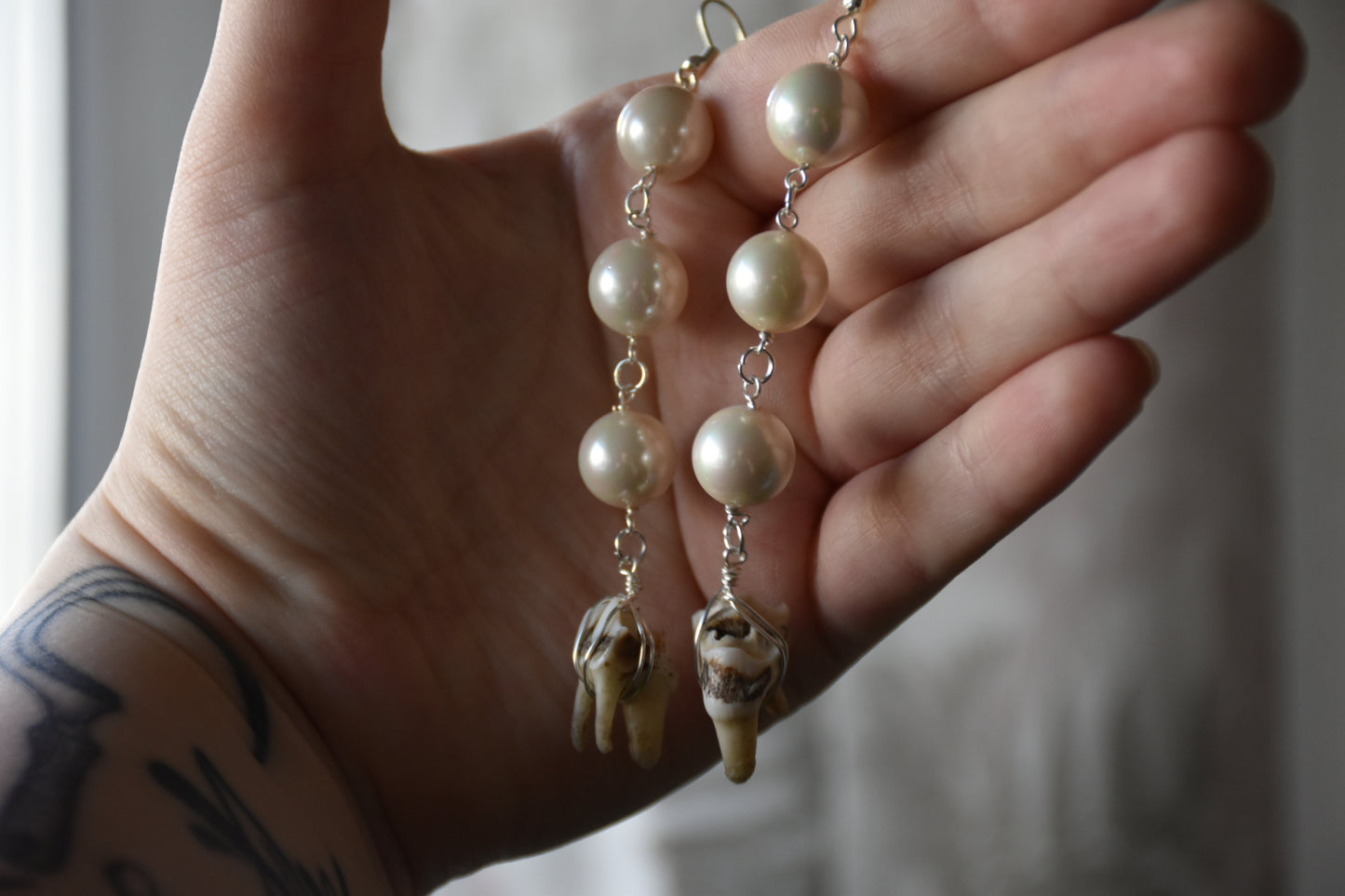 Second hand bead tooth earrings