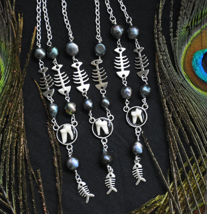 fox tooth fish necklaces