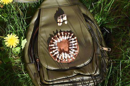 Green tooth backpack