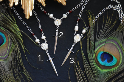 Sword tooth necklaces